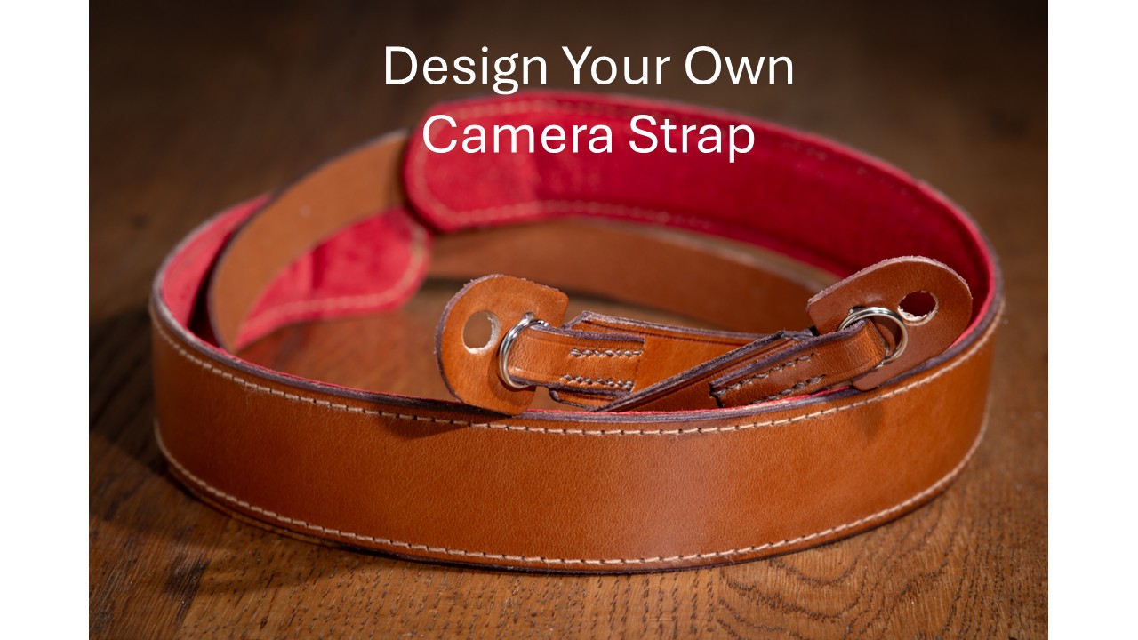 Rich brown camera strap with shoulder pad and tabs